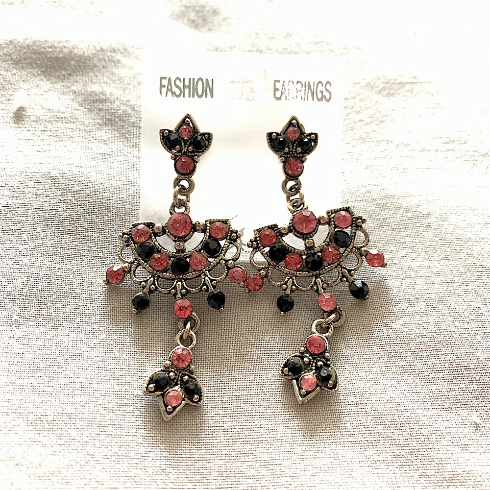 Beautiful pink and black stone earrings on metal base